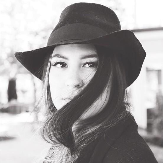 Amy Lin (fiction '17) wears a broad brimmed hat. 