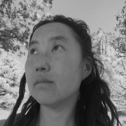 Sasha Hom headshot.